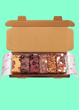 <p>Introducing the baked delights of Simply Cake Co: the perfect treats to make an occasion extra special (and sweet), delivered directly through your loved one's letterbox!</p><p>This varied selection of vegan brownies and bakes has something for everyone! The 6 x delicious, dairy-free flavours included in this gift box are:</p><ul>    <li>Triple Chocolate Chunk Brownie</li>    <li>Salted Honeycomb Brownie</li>    <li>Chocolate Orange Brownie</li>    <li>Raspberry Brownie</li>    <li>Triple Chocolate Chunk Blondie</li>    <li>Cookies 'n' Cream Rocky Road</li></ul><p>Have we got you drooling yet? You don&rsquo;t often find something so naughty and delicious that&rsquo;s vegan, gluten-free and soy free!&nbsp;This fab mix is the perfect gift to show a vegan friend just how much you care.</p><p>These are handmade in the UK with the best ingredients including couverture chocolate and British pea flour. Simply Cake Co. baked goods&nbsp;are packed full of chocolate, which gives them a shelf life of a good 10 days on arrival. Keep them wrapped up tight, or freeze if you want to keep them longer!</p><p><strong>Please note that this product is fulfilled by our partner Simply Cake Co. and therefore will be sent separately to our other cards and gifts.</strong></p><p>Ingredients:</p><p><em>Triple Chocolate Chunk Brownie</em><br /><br />Caster Sugar, Wh*te choc chunks (Sugar, Cocoa Butter, Rice Flour, Natural Flavouring, Emulsifier (sunflower lecithin)), M*lk Choc chunks (Sugar, Cocoa (cocoa butter, cocoa mass), Rice Flour, inulin, emulsifier (sunflower lecithin)), Dark Chocolate (White Sugar, Cocoa [50%] (cocoa butter, cocoa mass), emulsifier (Sunflower lecithin)), Baking Block (Sustainable Palm Oil, Rapeseed Oil, Water, Salt, Emulsifier: Mono- and Diglycerides of Fatty Acids; Flavouring, Vitamins A and D, Colour: Carotene), Water, Pea flour, Cocoa powder, Xanthan Gum.<br /><br /><em>Salted Honeycomb Brownie</em><br /><br />Caster Sugar, Dark Chocolate (White Sugar, Cocoa [50%] (cocoa butter, cocoa mass), emulsifier (Sunflower lecithin)), Baking Block (Sustainable Palm Oil, Rapeseed Oil, Water, Salt, Emulsifier: Mono- and Diglycerides of Fatty Acids; Flavouring, Vitamins A and D, Colour: Carotene), Water, M*lk Choc chunks (Sugar, Cocoa (cocoa butter, cocoa mass), Rice Flour, inulin, emulsifier (sunflower lecithin)), Pea flour, Cocoa powder, Honeycomb ((Sugar, Glucose Syrup, Non-hydrogentated Vegetable fat (palm), Bicarbonate of soda, Rice flour), Salt, Xanthan Gum.<br /><br /><em>Chocolate Orange Brownie</em><br /><br />Dark Chocolate (White Sugar, Cocoa [50%] (cocoa butter, cocoa mass), emulsifier (Sunflower lecithin)), Caster Sugar, Baking Block (Sustainable Palm Oil, Rapeseed Oil, Water, Salt, Emulsifier: Mono- and Diglycerides of Fatty Acids; Flavouring, Vitamins A and D, Colour: Carotene), Water, Pea flour, Cocoa powder, Xanthan Gum, Natural Orange flavouring.<br /><br /><em>Raspberry Brownie</em><br /><br />Dark Chocolate (White Sugar, Cocoa [50%] (cocoa butter, cocoa mass), emulsifier (Sunflower lecithin)), Caster Sugar, Baking Block (Sustainable Palm Oil, Rapeseed Oil, Water, Salt, Emulsifier: Mono- and Diglycerides of Fatty Acids; Flavouring, Vitamins A and D, Colour: Carotene), Water, Pea flour, Raspberries, Cocoa powder, Xanthan Gum, Freeze-Dried Raspberry Powder.<br /><br /><em>Cookies 'n' Cream Rocky Road</em><br /><br />M*lk Choc (Sugar, Cocoa (cocoa butter, cocoa mass), Rice Flour, inulin, emulsifier (sunflower lecithin)), Cookie Biscuits (Rice Flour, Sugar, Vegetable Fats (Palm, <strong>COCONUT</strong>), Corn Starch, Potato Starch, Corn Flour, Glucose Syrup, Cocoa Powder (3%), Dextrose, Refined Sunflower Oil, Raising Agent (Sodium Hydrogen Carbonate), Thickener (Xanthan Gum), Emulsifier (Sunflower Lecithin), Salt, Natural Vanilla Flavouring), Mallows (Glucose,-Fructose Syrup, Sugar, Dextrose, Carrageenan, Maize Starch, Hydrolized Rice Protein, Flavour (Vanilla), Polyphosphate, Colours: Red Beetroot and Titanium Dioxide), Oil.<br /><br /><em>Triple Chocolate Chunk Blondie</em><br /><br />Wh*te choc (Sugar, Cocoa Butter, Rice Flour, Natural Flavouring, Emulsifier (sunflower lecithin)), gluten-free flour blend (rice, potato, tapioca, maize, buckwheat), Baking Block (Sustainable Palm Oil, Rapeseed Oil, Water, Salt, Emulsifier: Mono- and Diglycerides of Fatty Acids; Flavouring, Vitamins A and D, Colour: Carotene), Water, Brown Sugar, gluten-free <strong>OAT</strong> flour, M*lk Choc chunks (Sugar, Cocoa (cocoa butter, cocoa mass), Rice Flour, inulin, emulsifier (sunflower lecithin)), Caster sugar, Xanthan Gum, Natural vanilla flavouring with other natural flavourings, Natural caramel flavouring.</p><p><strong>For allergens please see above in bold.</strong>&nbsp;Made in a bakery that handles&nbsp;<strong>MILK, EGGS, SOYA, NUTS &amp; PEANUTS</strong>&nbsp;therefore may contain traces. Please be aware that this product also contains coconut. Suitable for vegetarians, vegans and coeliacs.</p>